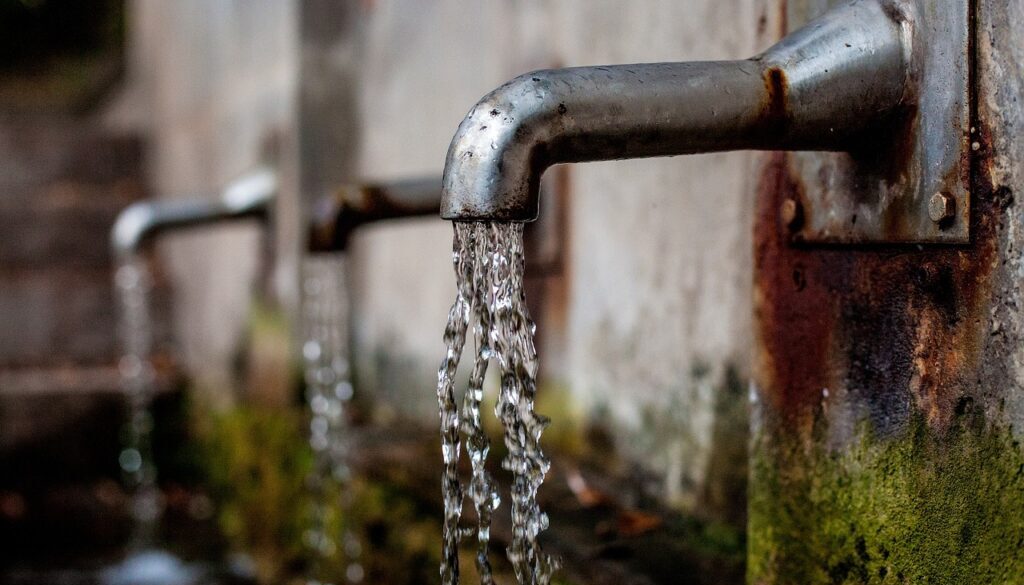 faucet pouring water