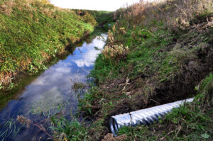 Installation of a drainage water management system in Sac County, Iowa.