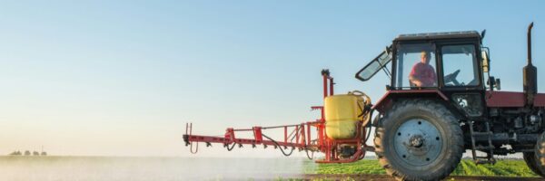 getty-images-UMR4CV45RiA-unsplash Farmer spraying a soybean field.