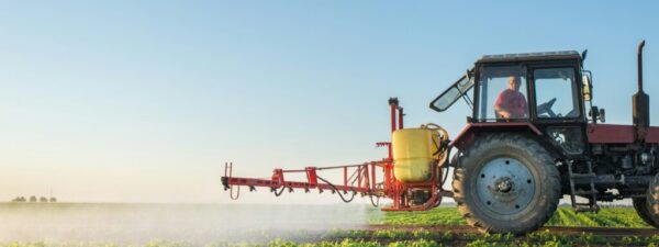 getty-images-UMR4CV45RiA-unsplash Farmer spraying a soybean field.