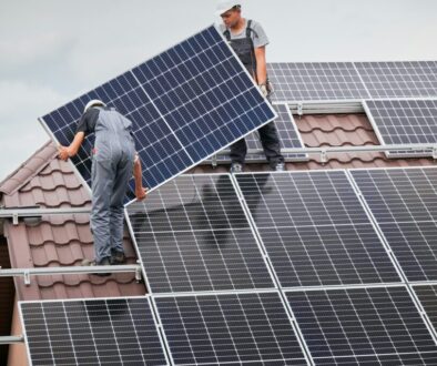 Men installing solar panels