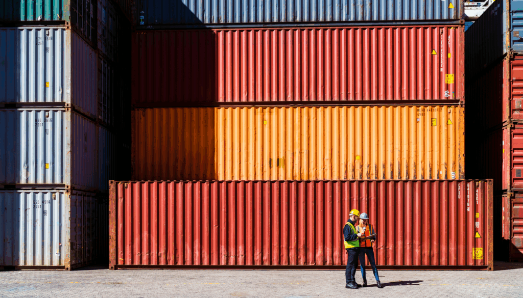 High res image-Workers in front of transportation cargo containers